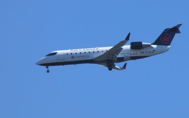 Canadair Regional Jet CRJ-200 (C-FDJA) - Shown here on approach is a Canadair Regional Jet CRJ-200 in the Summer of 2018.