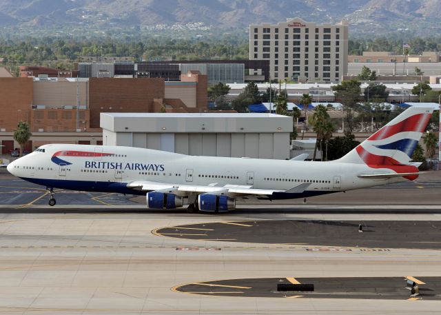 Boeing 747-400 (G-CIVB) - They were landing in heavy winds and as they touched down the left side of the plane went down quicker. This is why you can still see the right side of the winglet even on the ground. It was a lot more impressive in person than in the photo. 