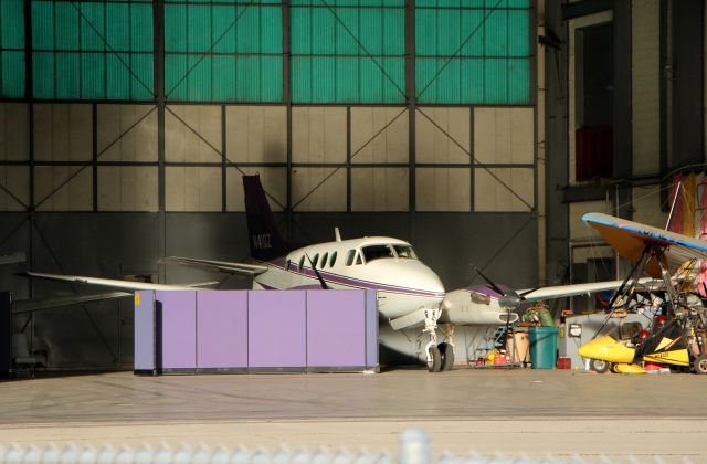 Beechcraft King Air 90 (N41DZ) - KOAR - A twin Beech in the hangar with privacy walls up!