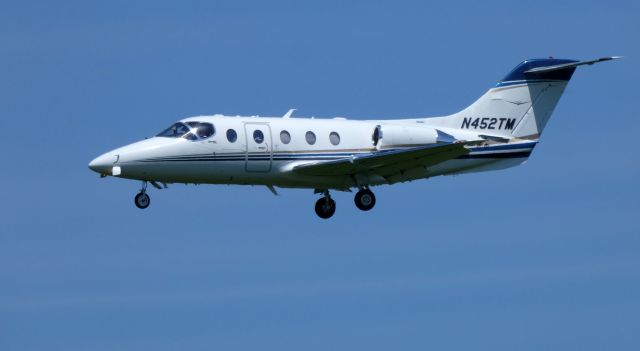 Beechcraft Beechjet (N452TM) - On final is this 2008 Hawker Beechcraft Beechjet 400XP in the Summer of 2019.