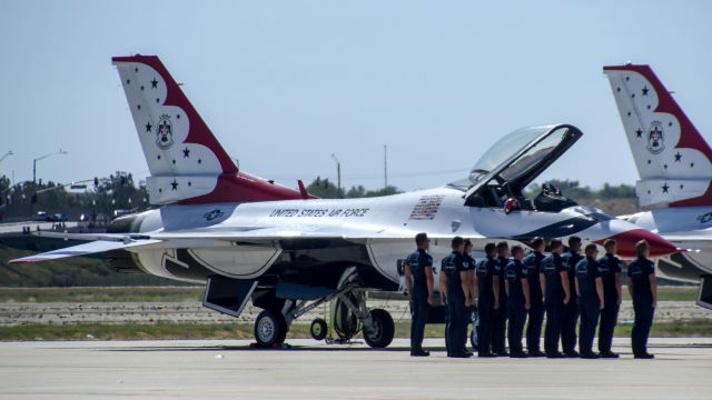 Lockheed F-16 Fighting Falcon — - At March RARB Airshow 2016 the outstanding ground crew stands at attention before commencing the ground demonstration part of the Thunderbirds demonstration 