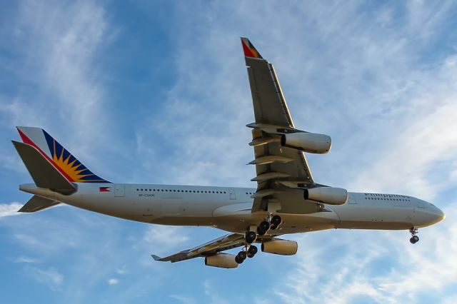 Airbus A340-300 (RP-C3430) - A now rare sight, this A340-300 arrives into the sunset at LAX back in 2009