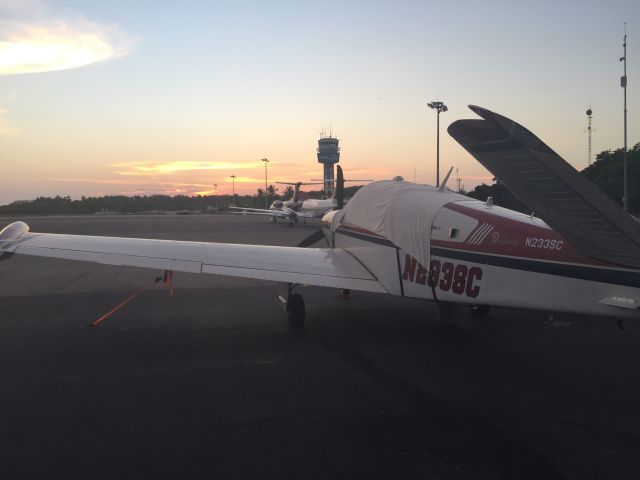 Beechcraft 35 Bonanza (N233SC) - My Bo sitting on the GA ramp in ZIH at sunset.