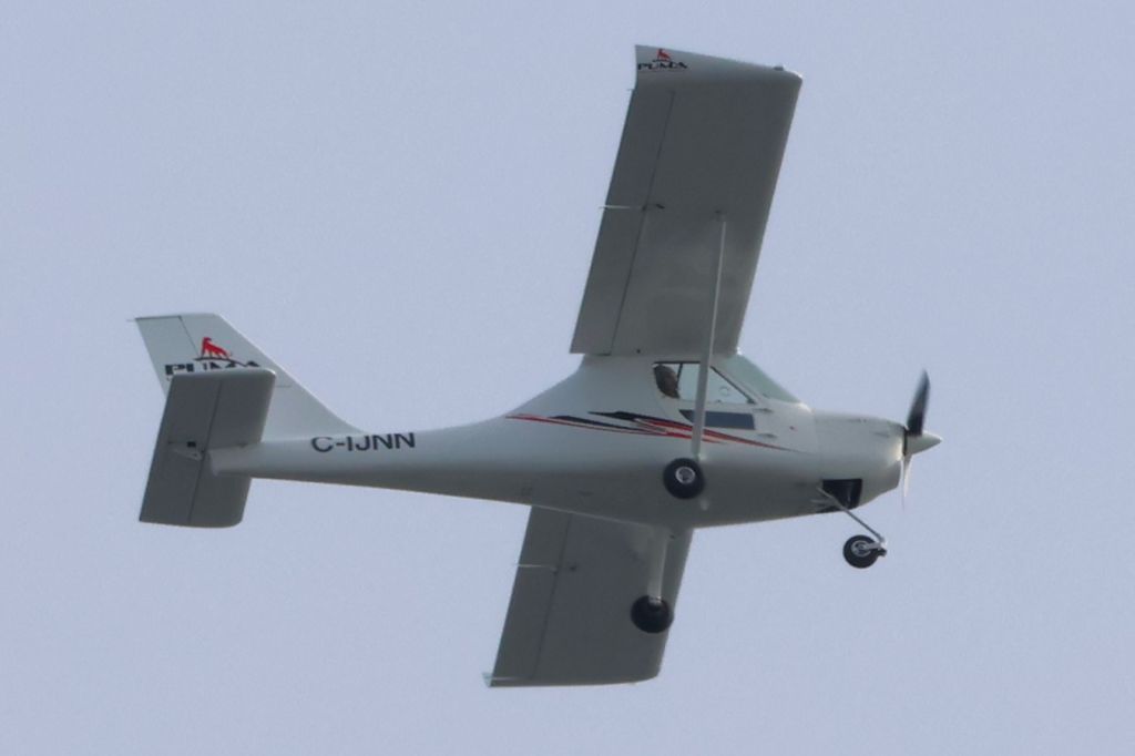 C-IJNN — - C-JINN BDC Aero Puma survolant le fleuve St-Laurent QC. à Lavaltrie le 25-02-2024 à 13:27