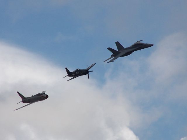 — — - MCAS Miramar Airshow 2006  San Diego, CA  Heritage Flight F-18, Bearcat and a ? .... not F-86!