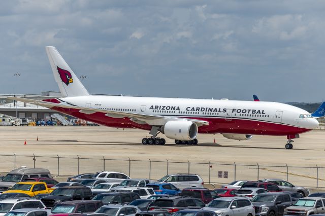 Boeing 777-200 (N867DA) - If you look closely you can see the word “Football” is missing a letter