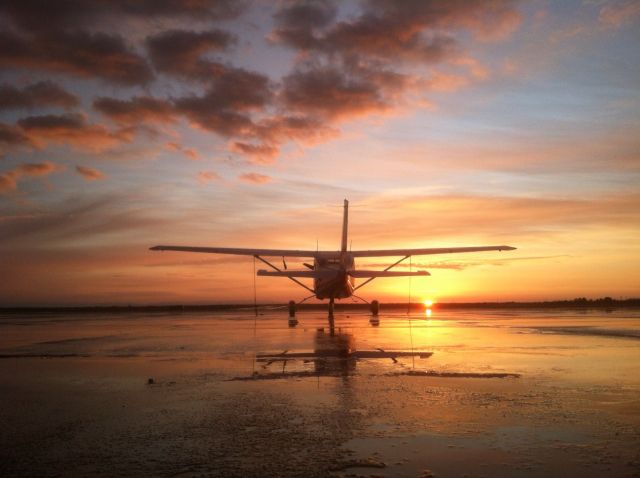 — — - Sunset on the ramp at Pecos Muni.