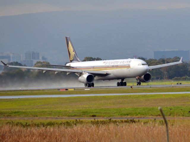 Airbus A330-300 (9V-STP) - Getting airborne off runway 23 on a gloomy, cold winters day and heading home to Singapore.  Wednesday 4th July 2012.