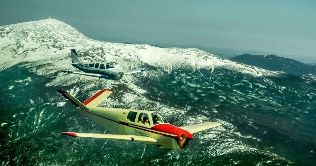 Beechcraft 35 Bonanza (N8787A) - Half of a 5 ship formation over Mt Washington, NH