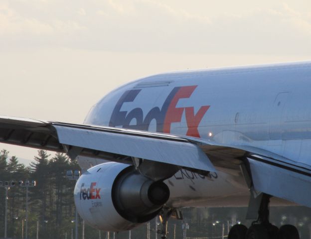 McDonnell Douglas DC-10 (N399FE) - A DC-10 turning off the runway at Manchester originating from Memphis.