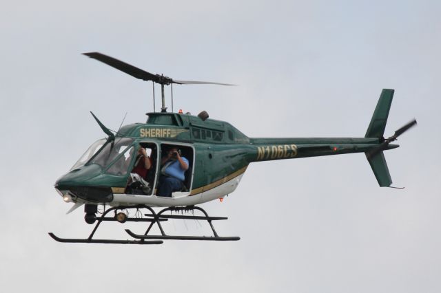 Cessna Citation CJ1 (N106CS) - Charlotte County Sheriffs Office helo flies over to photograph the crowd at the 2012 Florida International Airshow