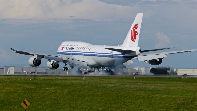 BOEING 747-8 (B-2480) - BOE72 lands on Rwy 34L to complete its B1 flight on 5/20/15. (ln 1518 / cn 41194).