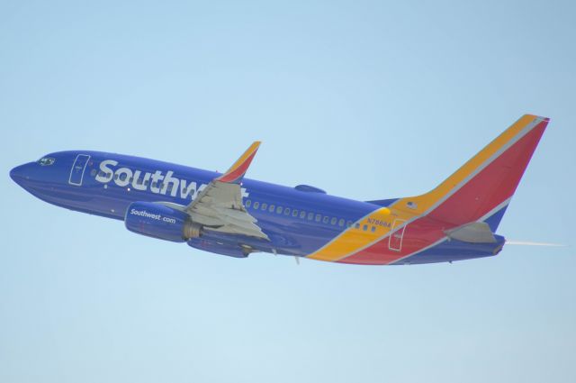 Boeing 737-700 (N7866A) - Southwest 835 climbs out of DSM's Runway 13 on her way to St. Louis. Photo taken June 21, 2020 at 5:40 PM with Nikon D3200 at 330mm.