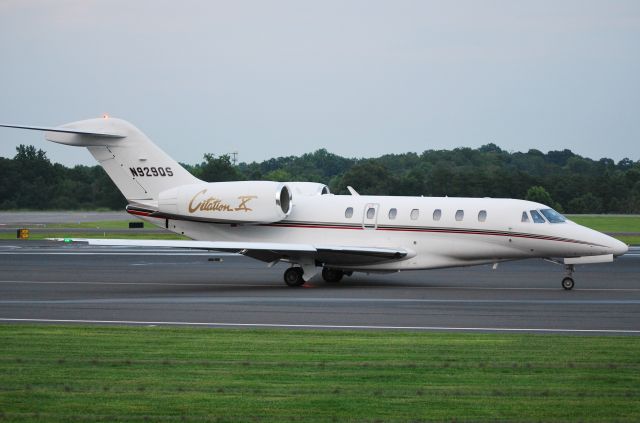 Cessna Citation X (N929QS) - NetJets taxiing out to runway 2 at KJQF - 7/17/13