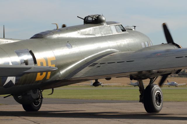 — — - Some of "Rosie the Riviters" handywork on display, as the Memphis Belle taxies out to the runway.