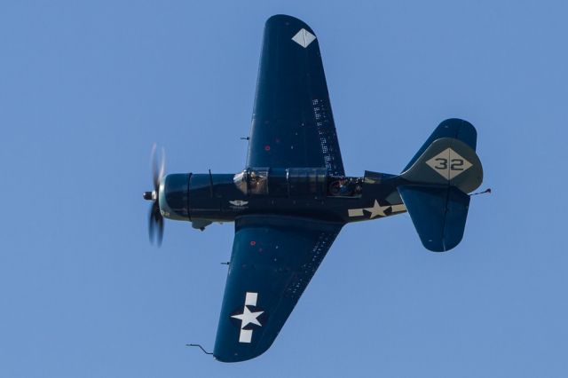 N92879 — - Curtis Wright SB2C Helldiver making a photo pass.