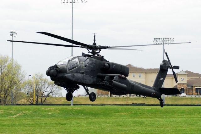 — — - AH-64 landing at the University of Central Missouri.