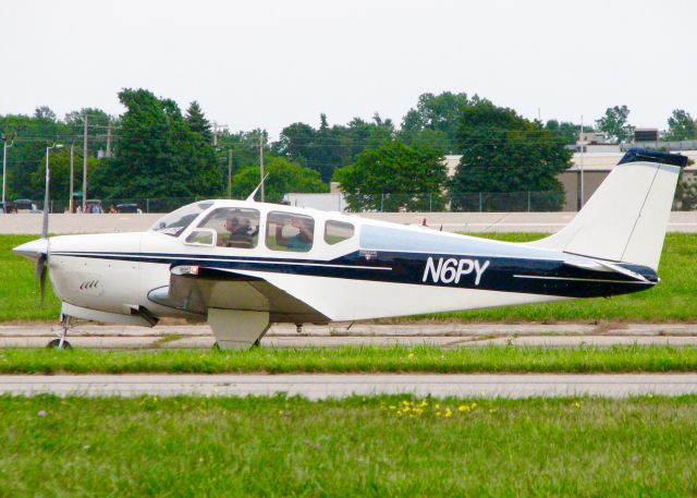 Beechcraft Bonanza (33) (N6PY) - At Oshkosh. 1962 Beech 35-A33 Debonair