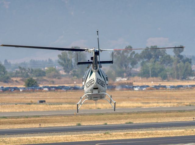 Bell JetRanger (N208EH) - Bell JetRanger 206 departing Livermore Municipal Airport. August 2020