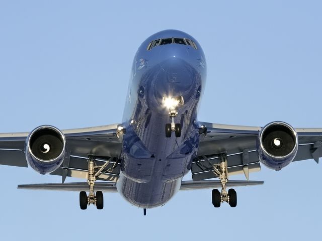 BOEING 767-300 (C-GZUM) - I really miss the ZOOM livery in the skies.  The bright blue makes for wonderful reflections.