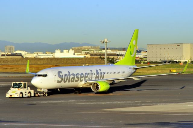 Boeing 737-800 (JA803X) - From my B777 window