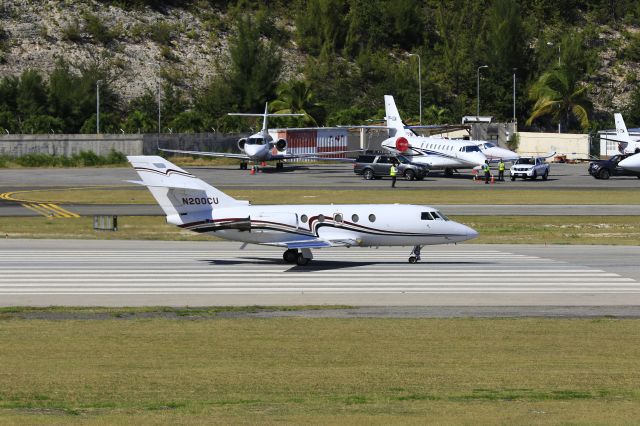 Dassault Falcon 20 (N200CU) - N200CU departing TNCM