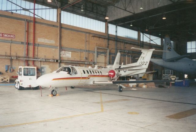 Cessna Citation V — - This is the Marines Citation 560 Ultra at New Orleans Naval Air Station. Behind it is the Navys UC-12 161322.