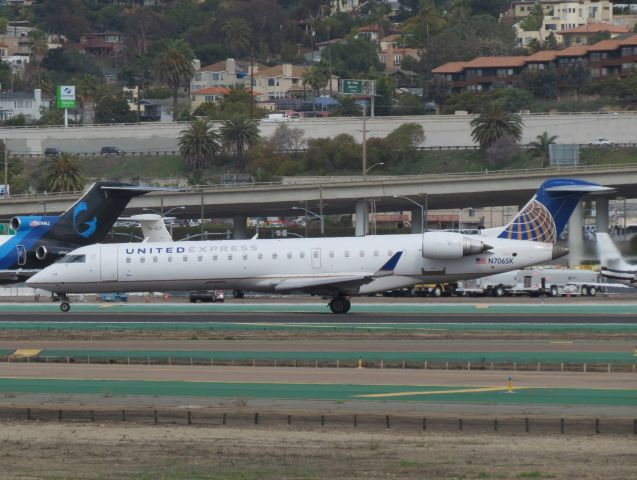 Canadair Regional Jet CRJ-700 (N706SK) - I like this picture because how well the thrust can be seen. Zero G N794AJ in the background.