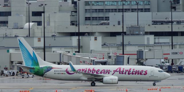 Boeing 737-800 (9Y-GEO) - KMIA, taken from room 520 of the Miami Airport Hilton.