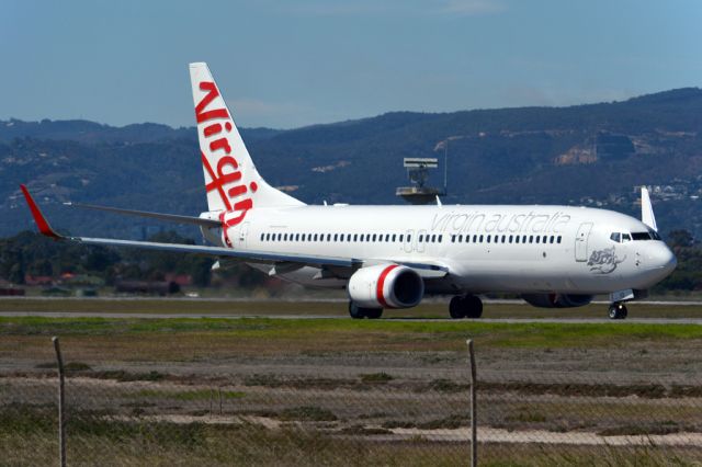 Boeing 737-800 (VH-YIQ) - On taxiway heading for take-off on runway 05. Monday, 14th April, 2014.