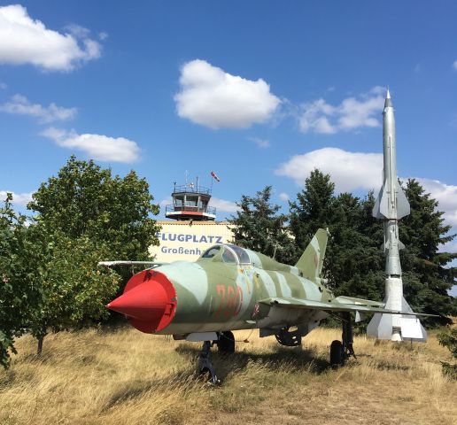 — — - Grossenhain airfield, the oldest functioning airfield in Germany, dating back to 1911. Picture of a MIG 21 SPS of the DDR airforce.