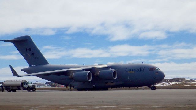 Boeing Globemaster III (17-7701) - In Iqaluit, Nunavut getting refuelled. 