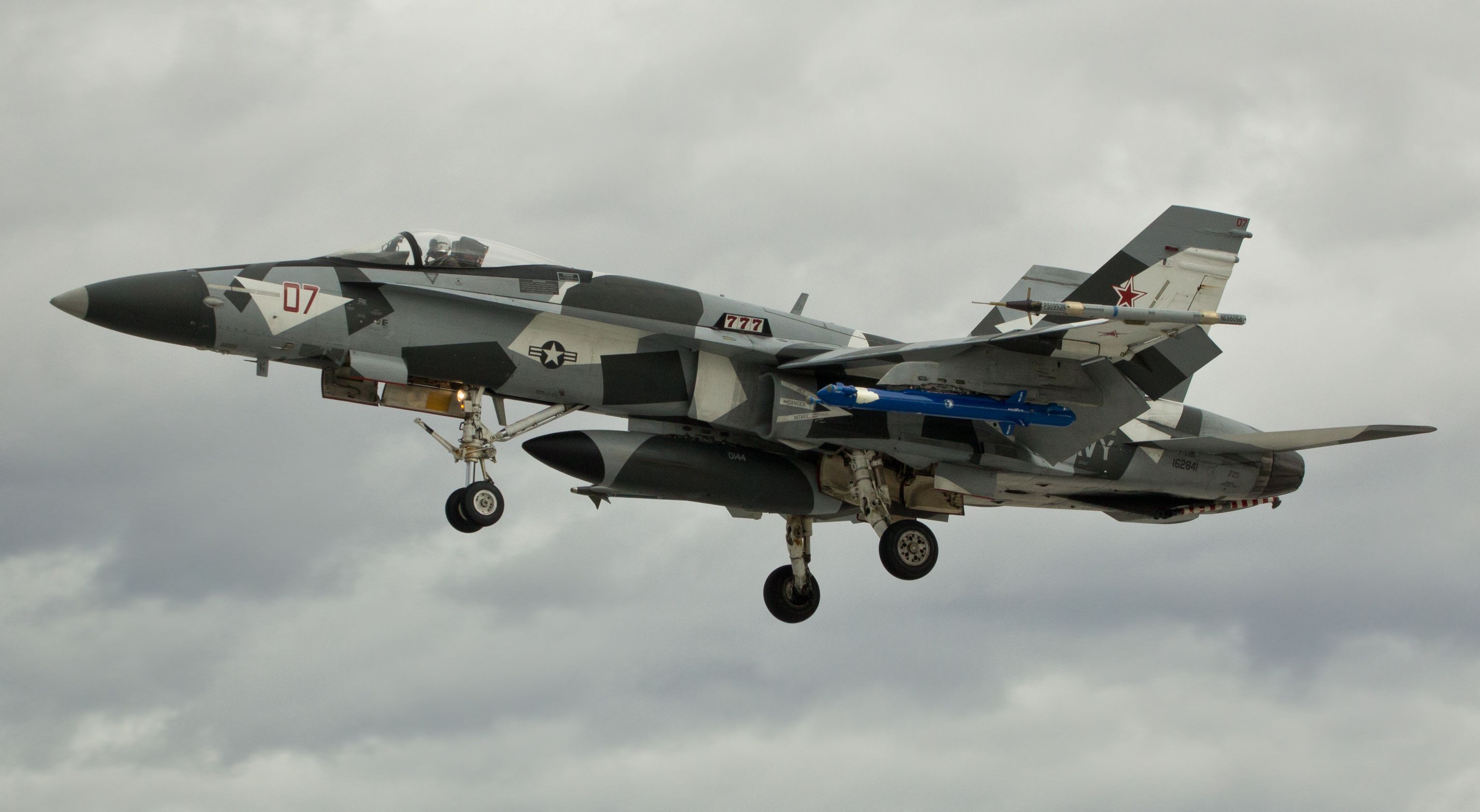 16-2841 — - An F/A-18A +  Hornet assigned to the VFC-12 "Fighting Omars" and painted in the Arctic Splinter camouflage scheme is seconds away from touching down on NAS Fallons runway 31L after being used as an adversary aircraft during a Top Gun training mission.