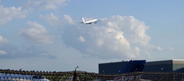 Boeing 757-200 (90015) - MORRISTOWN, NEW JERSEY, USA-AUGUST 09, 2019: A United States Air Force jet, registration number N90015, is seen taking off from Morristown Municipal Airport's runway 23 shortly after landing with President Donald Trump on board. The President is on vacation and Air Force One will be kept elsewhere while he is in New Jersey for ten days or so. The Air Force uses the smaller 757-200 when flying into Morristown because of the shorter runways.