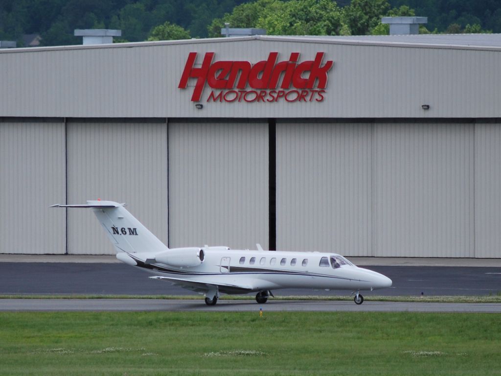 Cessna Citation CJ2+ (N6M) - NASCAR driver Mark Martin taxiing from the Hendrick Motorsports hangar to runway 20 at KJQF, the day after the Coca-Cola 600 - 5/26/09