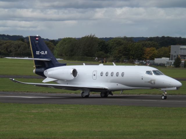 Cessna Citation Sovereign (OE-GLR) - Back tracking Runway 27 at Gloucestershire Airport.