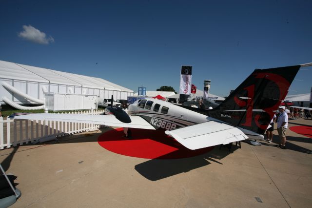 Beechcraft Baron (58) (N2368B) - To see more photos from the 2013 EAA Airventure, click here- a rel=nofollow href=http://www.facebook.com/media/set/?set=a.10153121083865078.1073741840.283142505077&type=1&l=dc84cd9463https://www.facebook.com/media/set/?set=a.10153121083865078.1073741840.283142505077&type=1&l=dc84cd9463/a