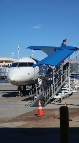 — — - Waiting to board at Salt Lake City for Palm Springs 