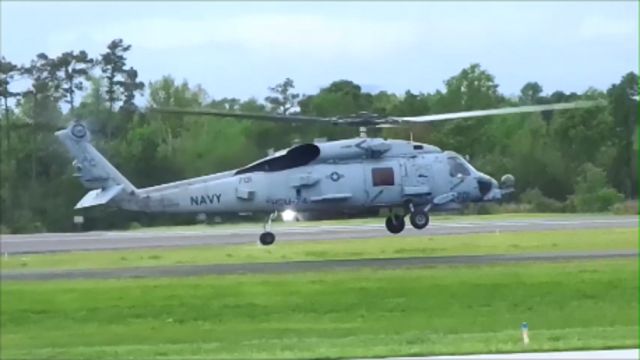 — — - US Navy HSM-74 Squadron MH-60R Helicopter #701 lifting off from Grand Strand (KCRE) Airport in North Myrtle Beach, SC on 4/17/2015.