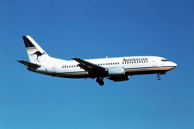 Piper Cherokee (VH-TAU) - AUSTRALIAN AIRLINES - BOEING 737-376 - REG : VH-TAU (CN 23486/1286) - ADELAIDE INTERNATIONAL AIRPORT SA. AUSTRALIA - YPAD 20/2/1988 35MM SLIDE CONVERSION USING A LIGHTBOX AND A NIKON L810 DIGITAL CAMERA IN THE MACRO MODE.