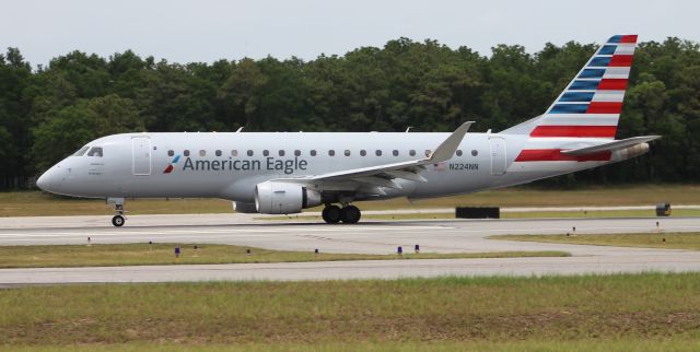 Embraer 170/175 (N224NN) - An Envoy Air Embraer E170-200LR on its takeoff roll down Runway 26 at Pensacola International Airport, FL - June 7, 2019.