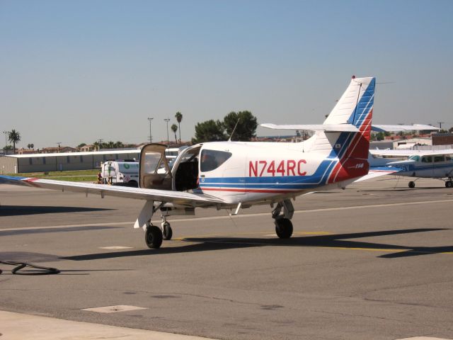 Rockwell Commander 114 (N744RC) - PARKED AT FULLERTON