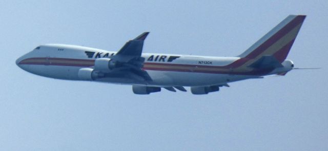 Boeing 747-400 (N712CK) - Shortly after departure is this 2002 Kalitta Air Boeing 747-4B5F in the Summer of 2024.