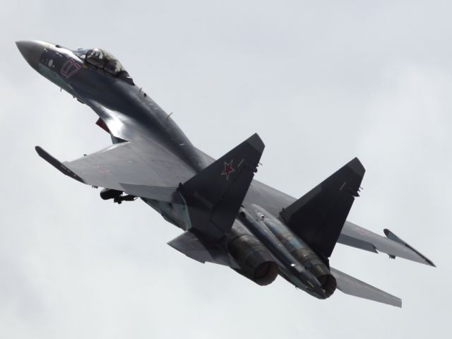 — — - A Sukhoi SU-27 gets airborne at PAS 2013.