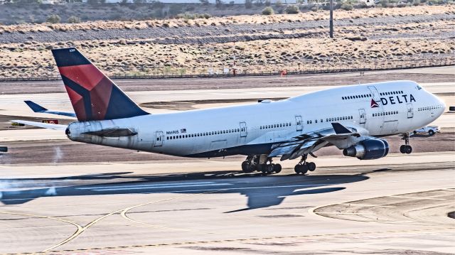 Boeing 747-400 (N669US) - Delta Airlines B744 operating a military charter from Riverside Air Force Base located in Riverside County California. This was one of the last flights for this aircraft as it was soon flown to KMZJ to be scrapped.