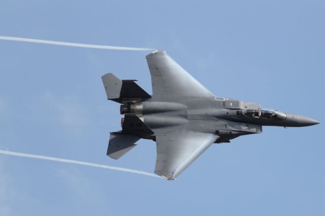 — — - High speed flypast producing condensation cloud and vortices.