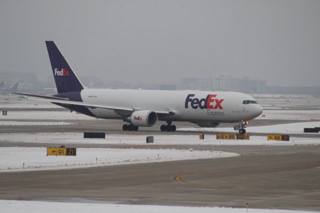 BOEING 767-300 (N151FE) - FedEx 767-300F Landed on runway 28C and taxiing to the FedEx ramp at Chicago O'hare from Memphis