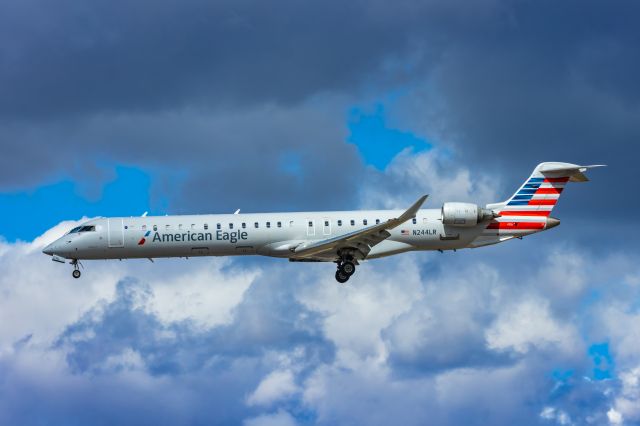 Canadair Regional Jet CRJ-900 (N244LR) - A Mesa Airlines CRJ900 landing at PHX on 2/26/23. Taken with a Canon R7 and Tamron 70-200 G2 lens.