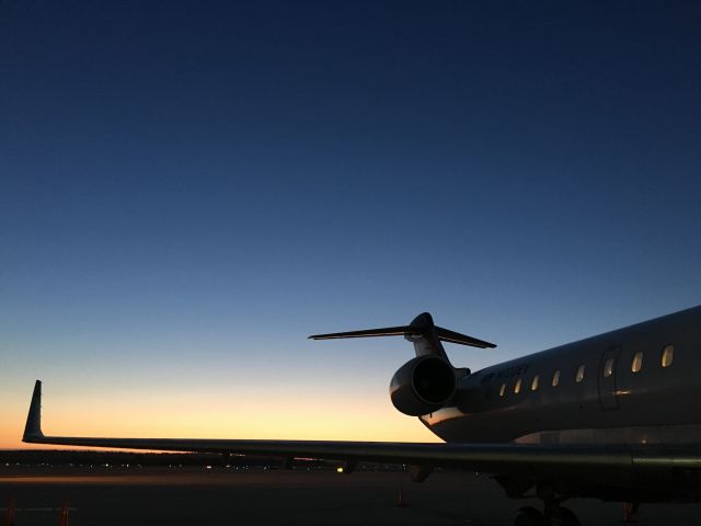 Canadair Regional Jet CRJ-700 (N722EV) - Beautiful sunrise shot taken at 5:12AM local time. Getting ready to be fueled and operate flight 5289 to Atlanta.