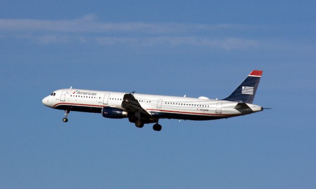 Airbus A321 (N578UW) - American A321 in US Airways retro livery arriving to BOS on 1/10/21. 